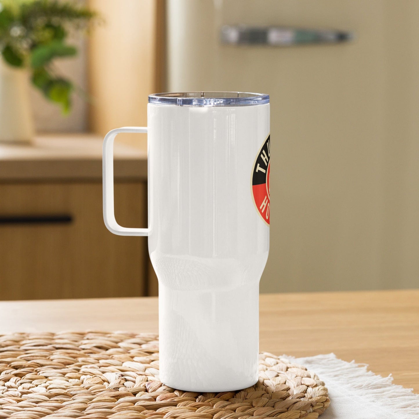 Travel mug with a handle